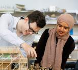 Students working on an architectural model