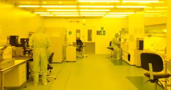 Scientists working in a cleanroom