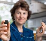 Rebecca Fitzgerald demonstrates the capsule sponge