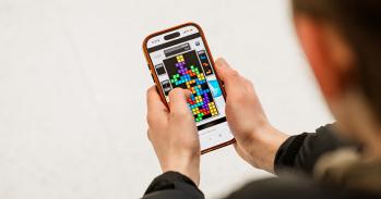 Person playing Tetris