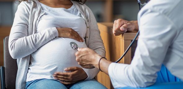 Credit: GettyImages / Prostock-Studio Pregnant black woman