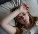 Menopausal woman experiencing a hot flush (stock image)