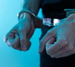 Hands in handcuffs