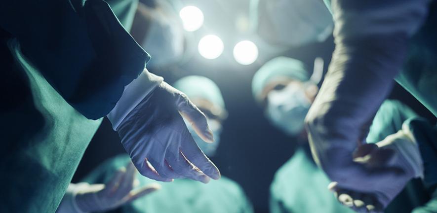 Surgeons preparing for an operation