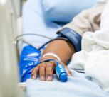 Male patient in a hospital bed