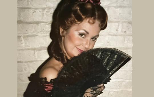 Janine Roebuck as Flora in La Traviata by Verdi at New Sadler's Wells Opera