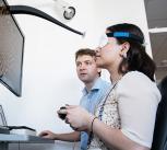 Dr Nick Cunniffe running a 'visual evoked potential' test with a trial participant in the Cambridge Clinical Vision Laboratory.