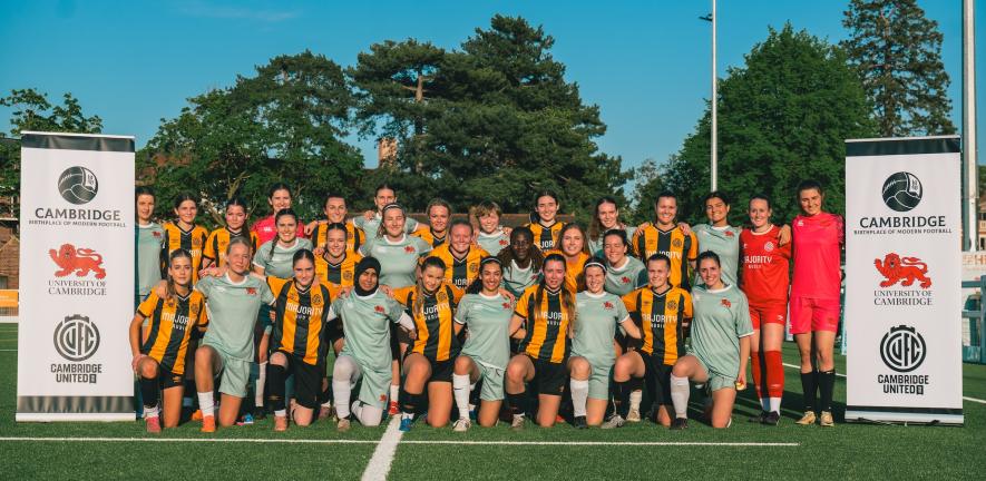 CUAFC and CUFC women's teams stand together