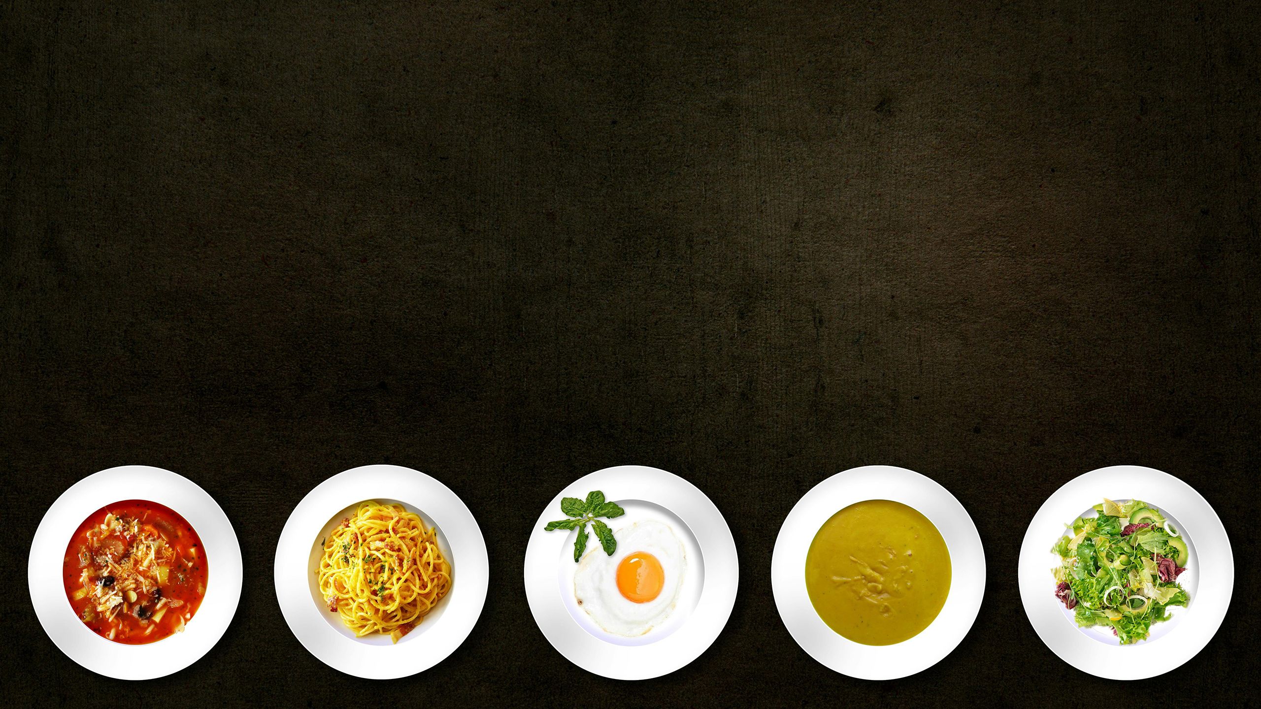 Flatlay of various dishes including pasta, egg, soup, and croissant on textured background.