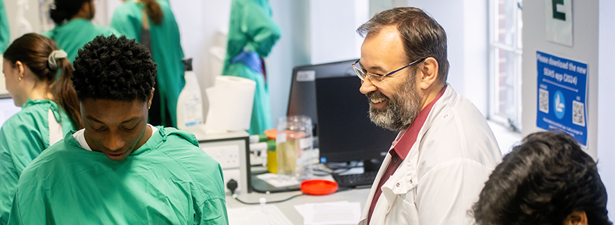 Academics at University of Cambridge at a live practical session in a laboratory.